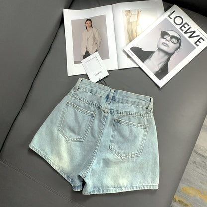 Pocket hole denim shorts