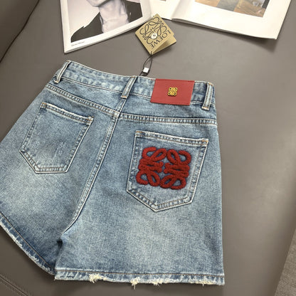 Denim shorts with towel embroidery on the back pockets