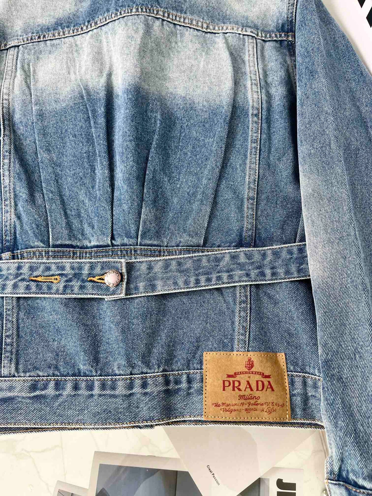 Logo embellished washed denim belted jacket