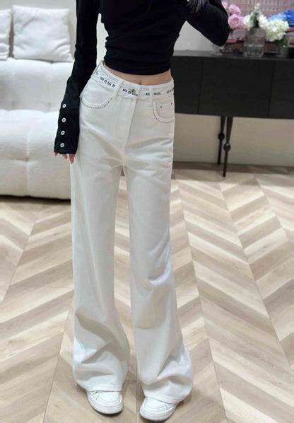 White jeans with logo on waist