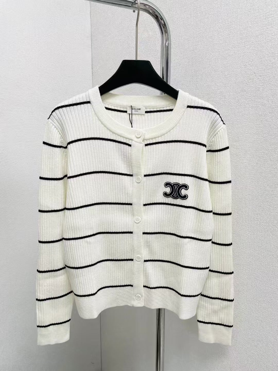 CL launches new striped knitted cardigan